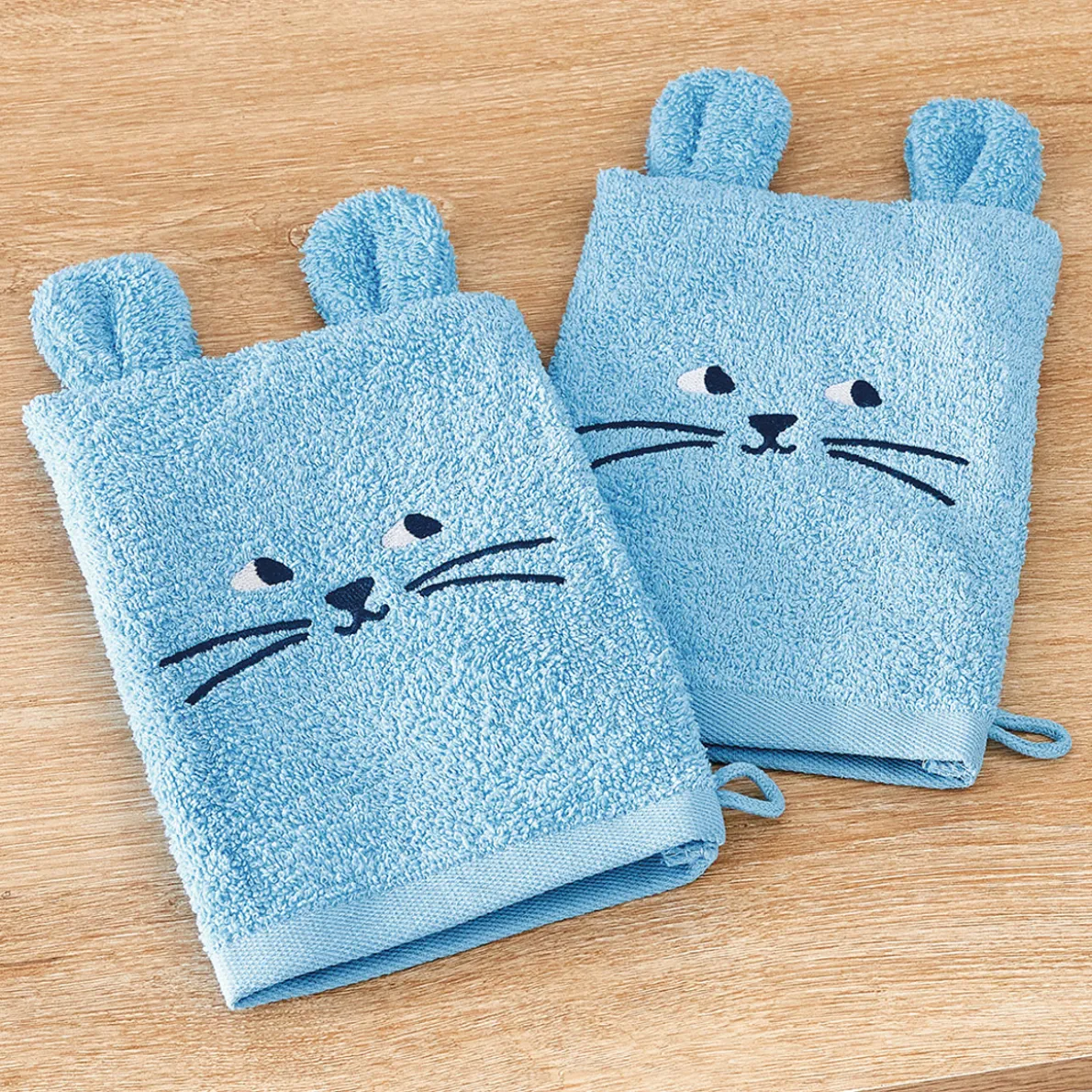 La tête dans les étoiles 2 gants de toilette